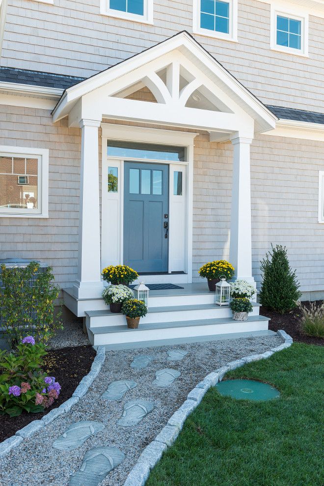 Front entry with blue door and white porch trim painting