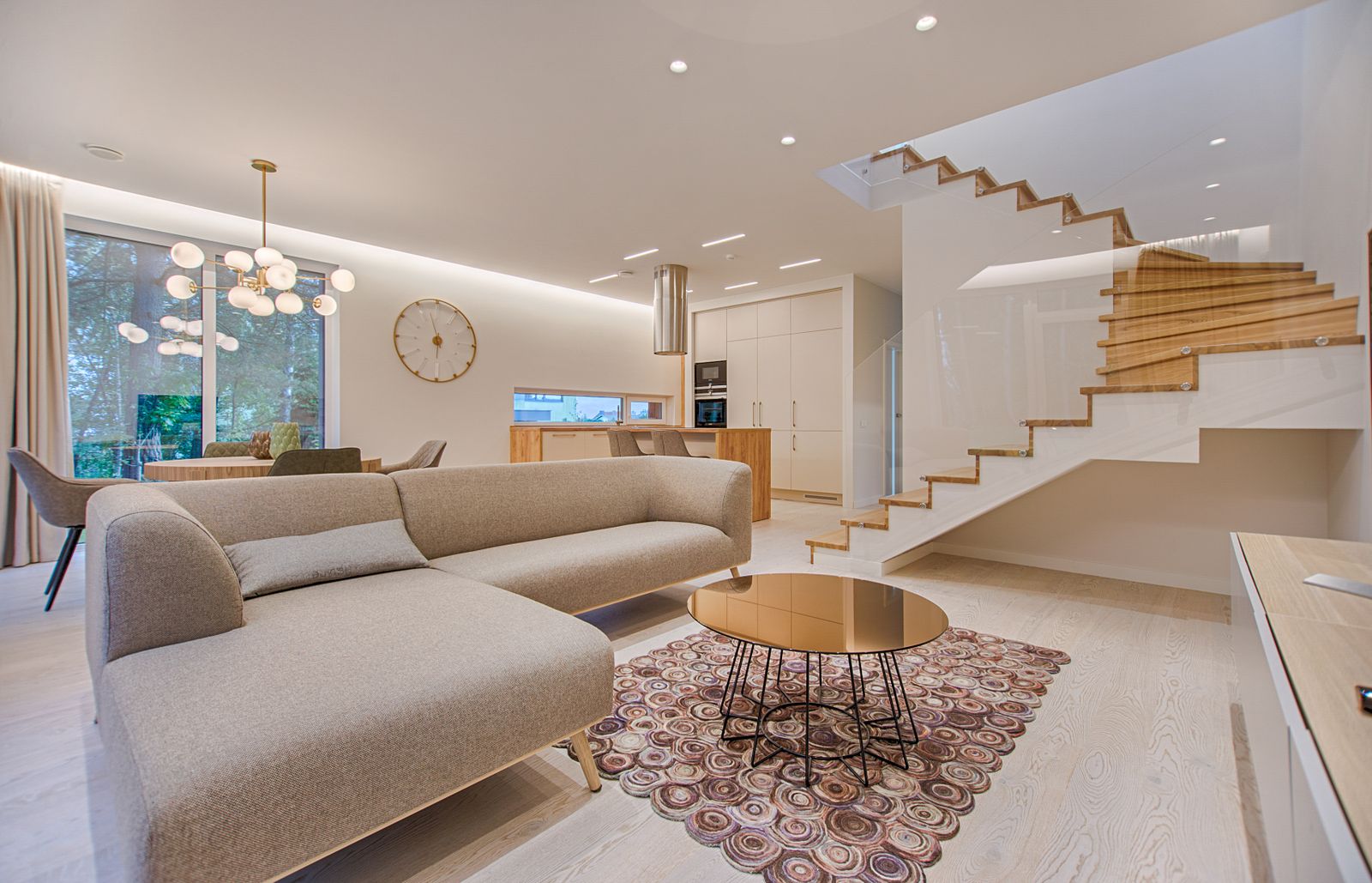 Luxury living space with cove lighting at the ceiling perimeter
